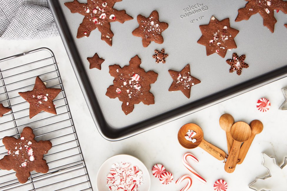 Gingerbread cookies with peppermint crumbs on Select by Calphalon Nonstick Bakeware.